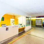 A side view of the Mercy Health Werribee hospital main reception desk.